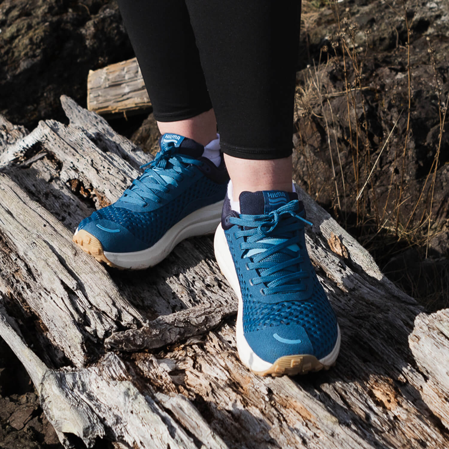 A pair of Stellar Blue Hilma running shoes