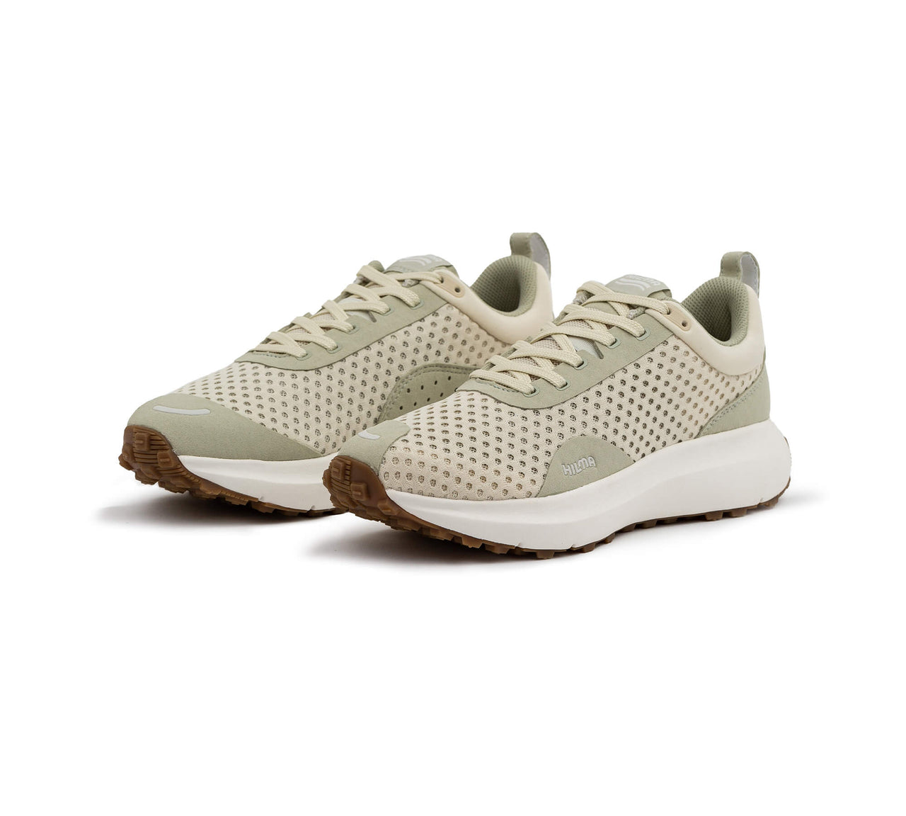 Front side view of a pair of the Everywhere Hilma Running shoe in Frozen Dew