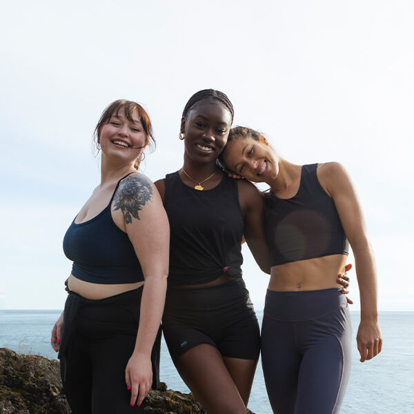 Three women standing together