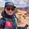 Woman wearing Hilma's Black Running Hat